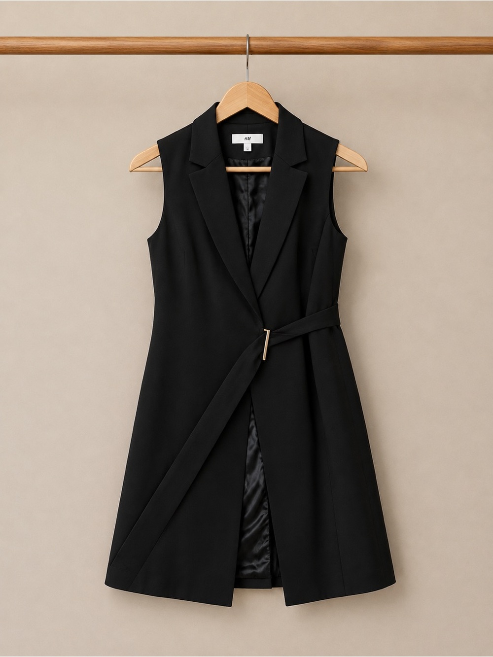 H&M Black sleeveless wrap over jacket dress in size M.
